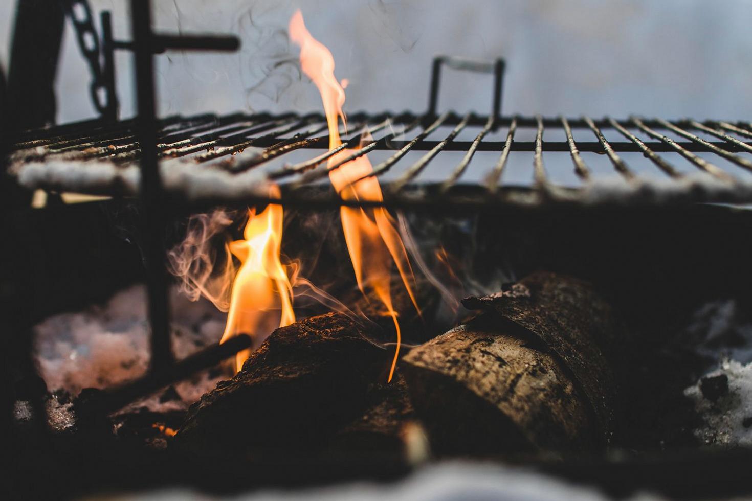 Burning wood in grill